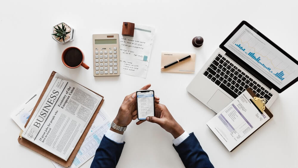 Picture of accountant on workdesk.