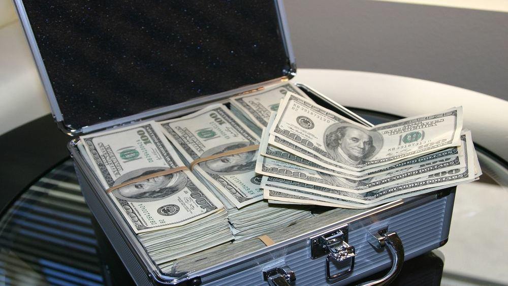 Picture of a metal briefcase filled with USD