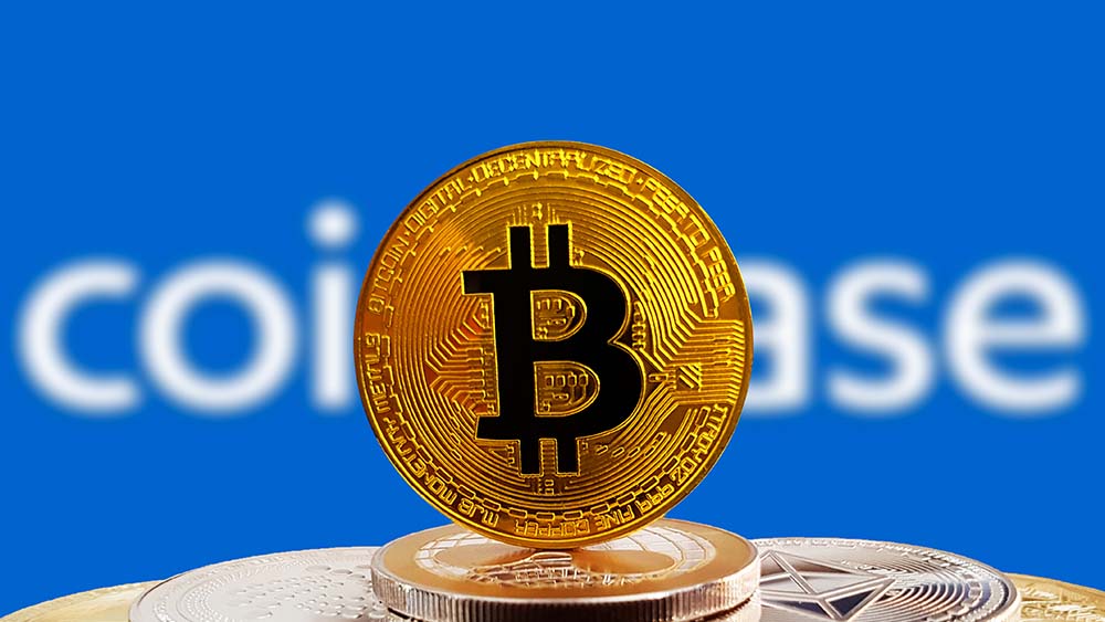 Coinbase logo with BTC coin in focus